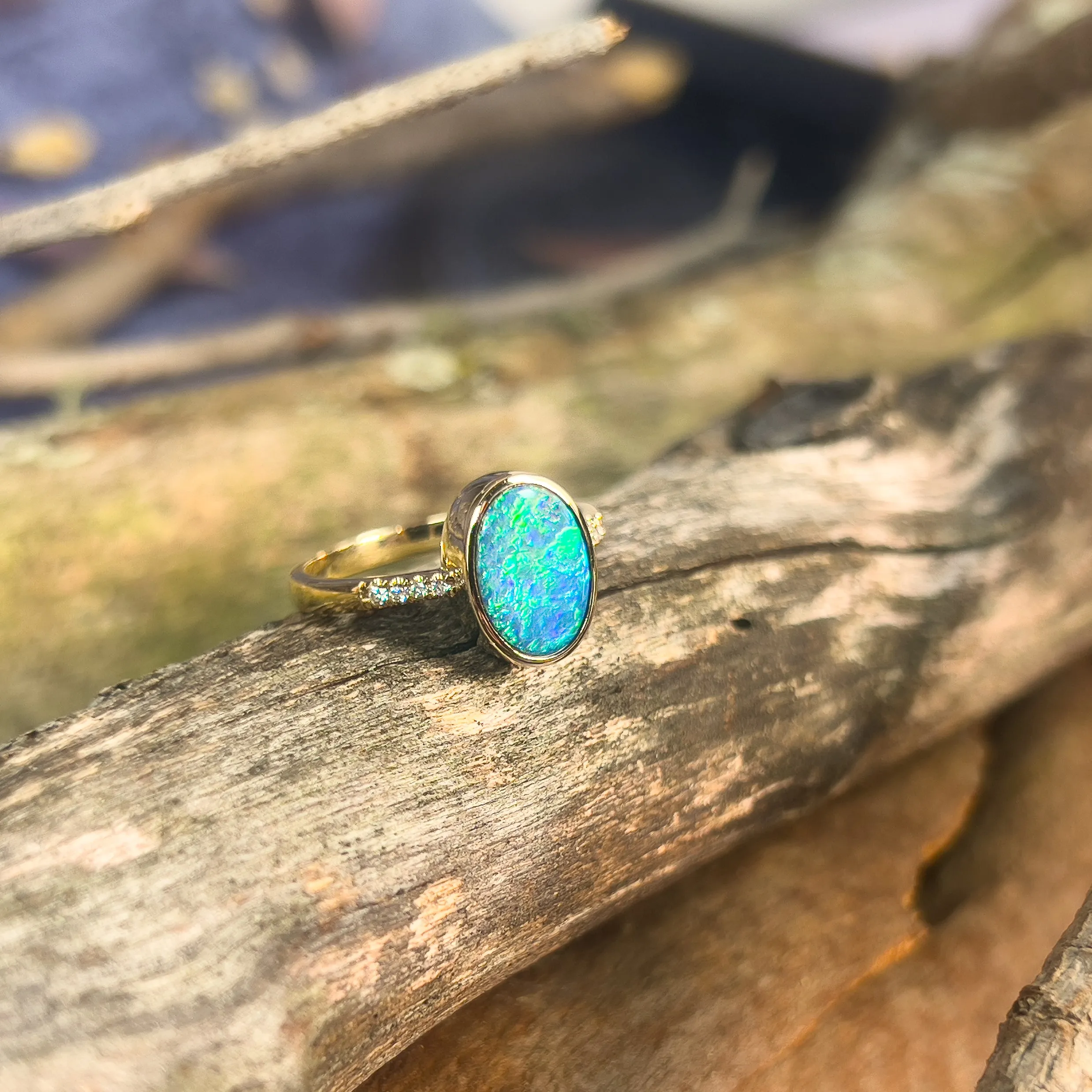 14kt Yellow Gold Black Opal 1.67ct doublet and diamond ring