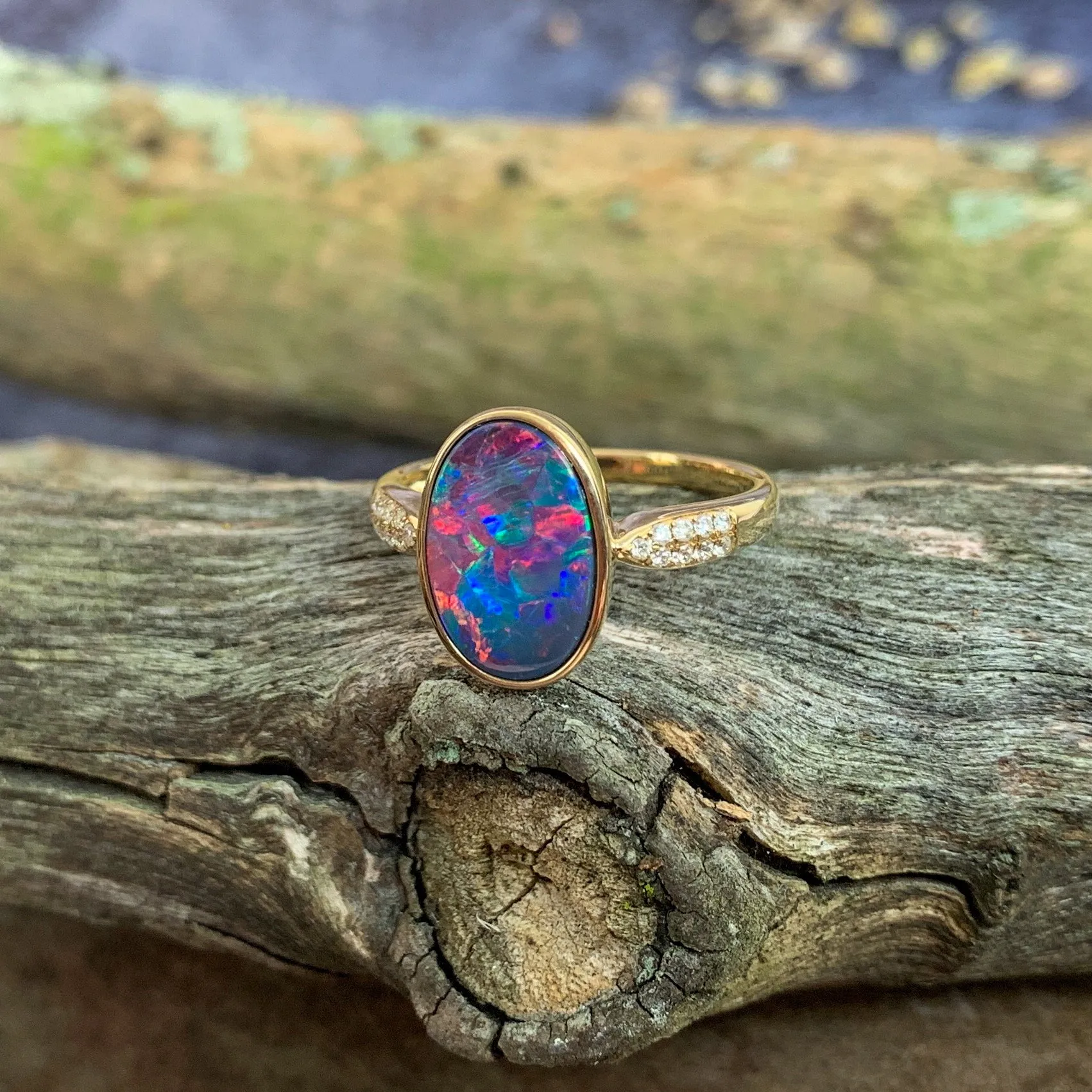 14kt Yellow Gold Oval Fire Opal doublet and diamond ring