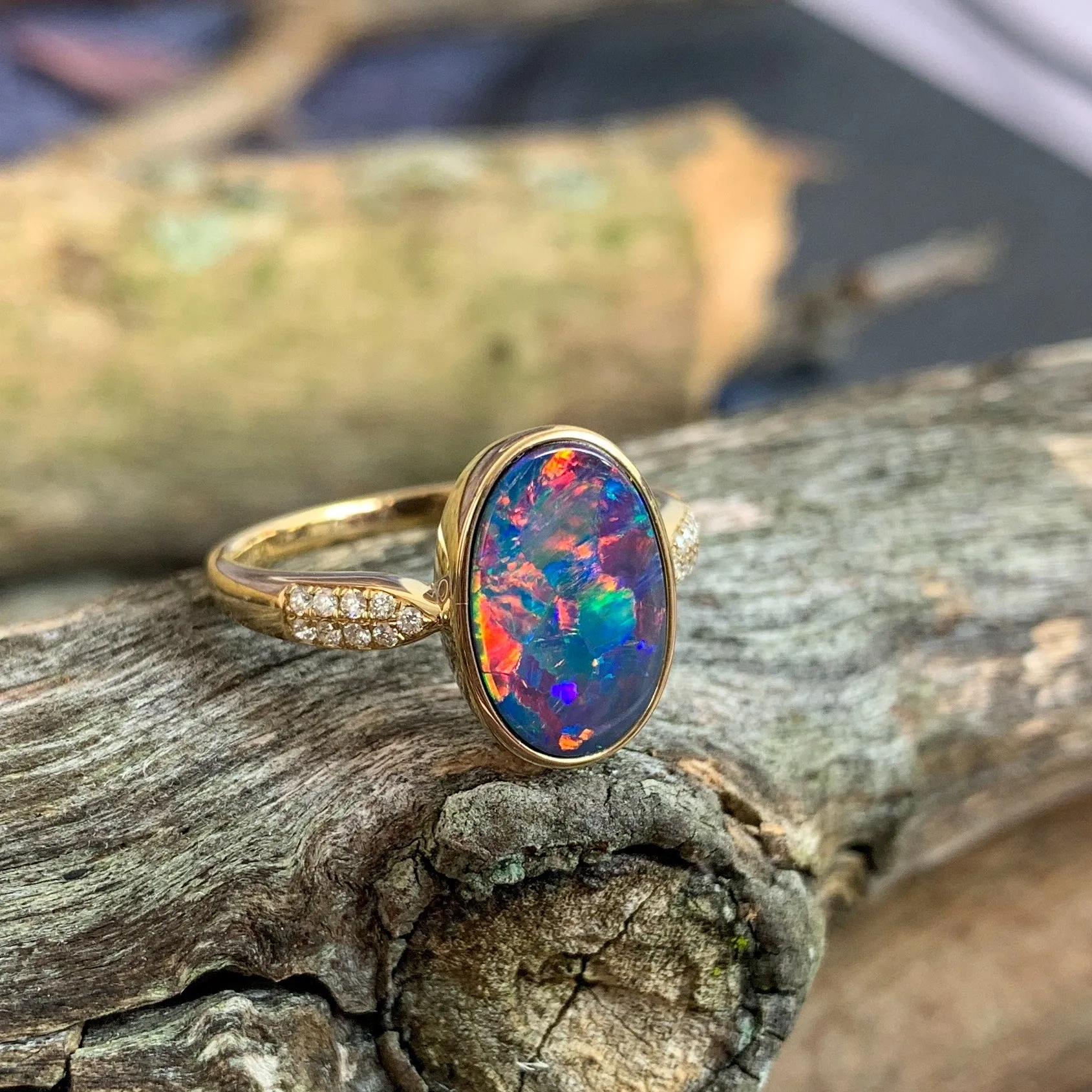 14kt Yellow Gold Oval Fire Opal doublet and diamond ring