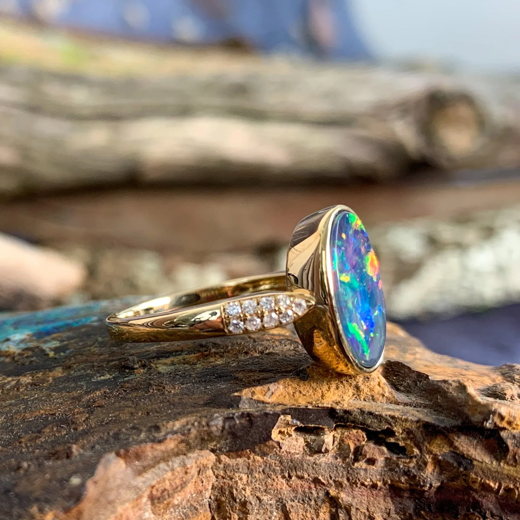 14kt Yellow Gold Oval Fire Opal doublet and diamond ring