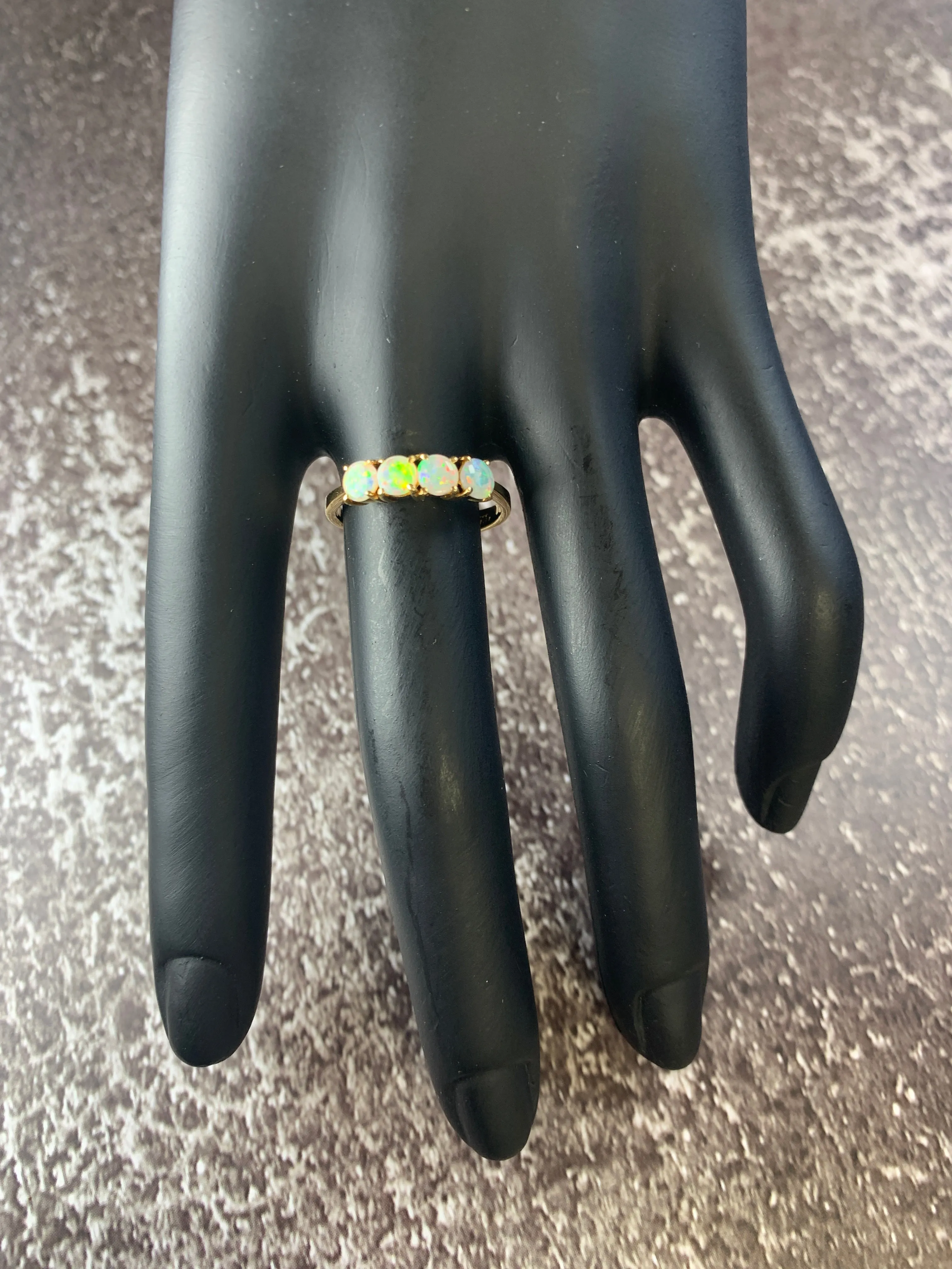 18kt Yellow Gold eternity ring with 5 Crystal Opals