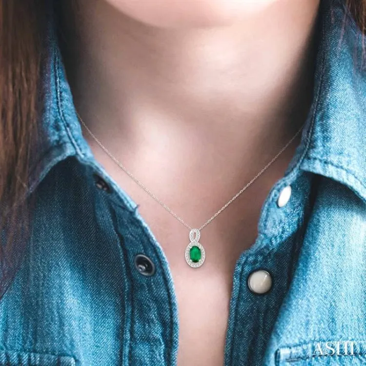 6x4 MM Oval Cut Emerald and 1/10 Ctw Round Cut Diamond Pendant in 10K White Gold with Chain