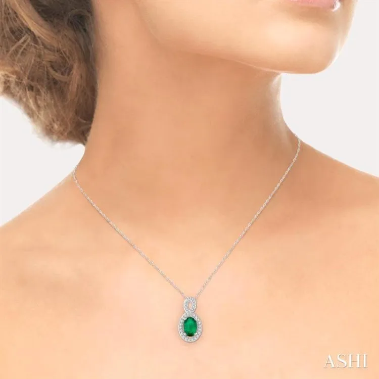 6x4 MM Oval Cut Emerald and 1/10 Ctw Round Cut Diamond Pendant in 14K White Gold with Chain