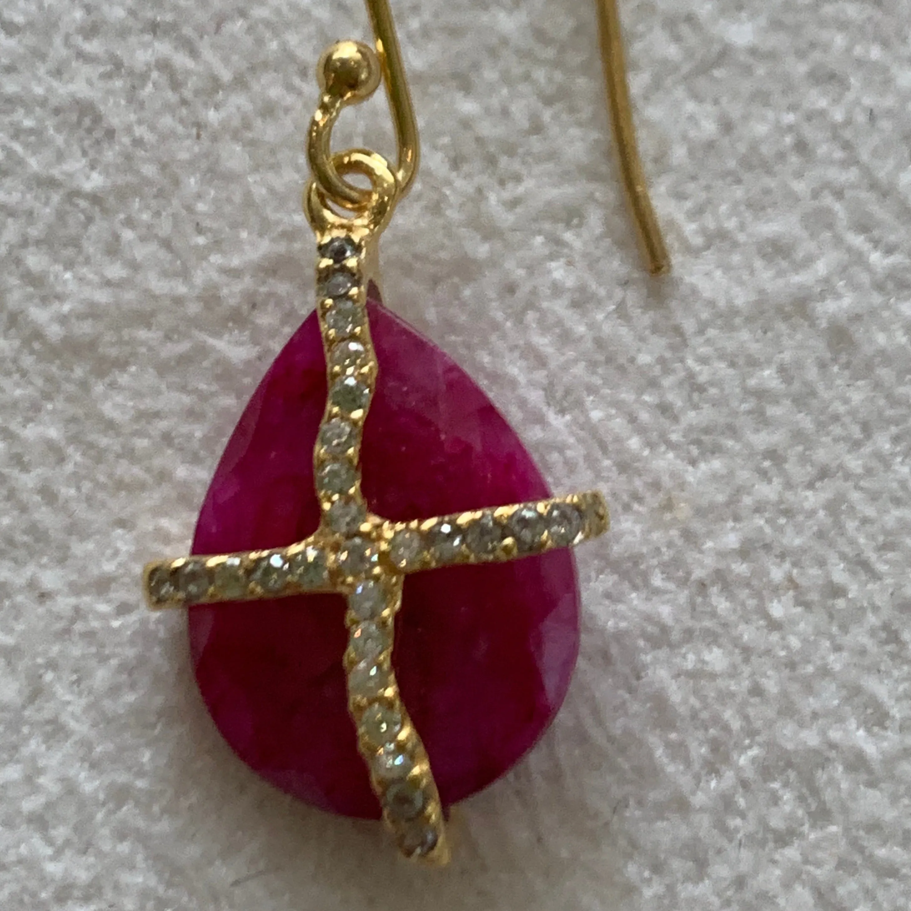 Teardrop Ruby with a sparkely cross AGP 0033E